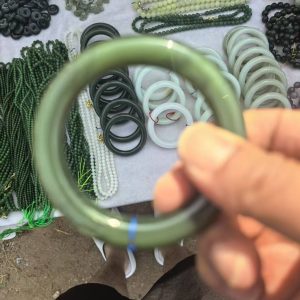 Assorted Jade Jewelry : Bracelets, Bangles, Pendants, etc.